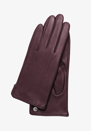 Gants en cuir bordeaux avec trois coutures sur le dos, texture douce et logo circulaire sur le poignet. Design classique.