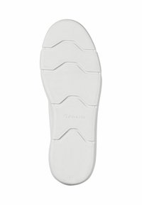 Semelle de sneaker blanche avec une surface texturée, présentant un motif en ondulation et le nom de la marque "Tamaris" en relief près du talon. Taille 37.