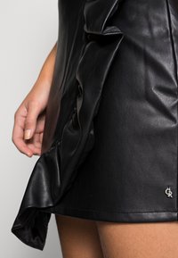 Colourful Rebel YOLENE RUFFLE SKIRT WOMEN - Saia envelope - black