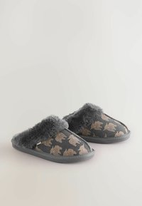 Gray slippers with faux fur lining and gold animal print. Soft texture, open back design, and flat rubber sole for indoor use.