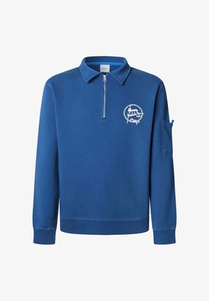 Suéter azul con collar de media cremallera, puños acanalados y detalle de logo en el pecho. Fabricado con un tejido suave y texturizado.