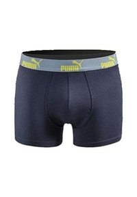Dark blue men's boxer briefs with a light gray waistband featuring yellow Puma logos and Puma text evenly spaced around it.