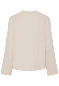 Light beige long-sleeve blouse made of textured fabric with a relaxed fit. Features a round neckline and discreet stitching detail.