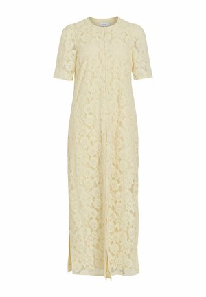 Longue robe en dentelle crème avec manches courtes, col rond, motif floral, fermeture à boutons sur le devant et fentes latérales.