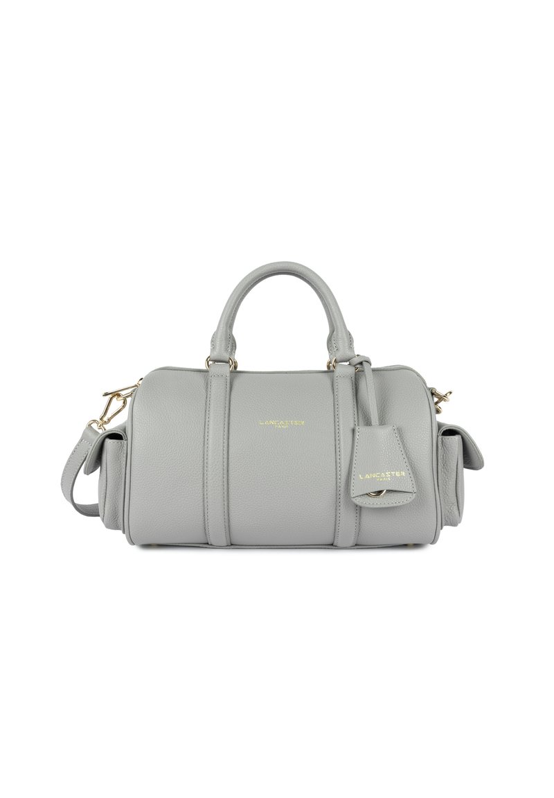 Borsa a mano in pelle grigia con design strutturato, doppi manici, tracolla staccabile e un piccolo etichetta. Presenta dettagli in hardware dorato.