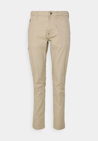 Beżowe bawełniane spodnie o prostych nogawkach, z przednimi kieszeniami i zapięciem na guzik. Gładka faktura z minimalnym zdobieniem.