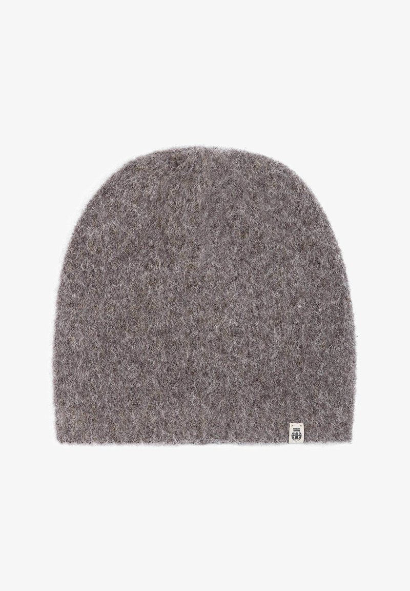 Gray knitted beanie made from soft, fuzzy material. Rounded shape with a small brand tag on the side. Textured finish with subtle variations.