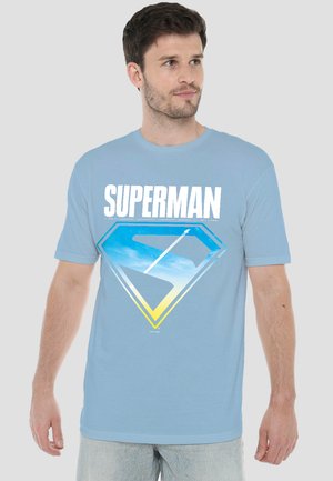 Cotton Soul, SUPERMAN 2025 NEW LOGO FLIGHT - T-Shirt print - light blue