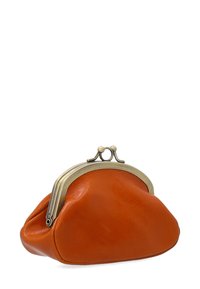 Orange leather pouch with a rounded bottom and a brass frame closure. Smooth texture with a minimalist design.