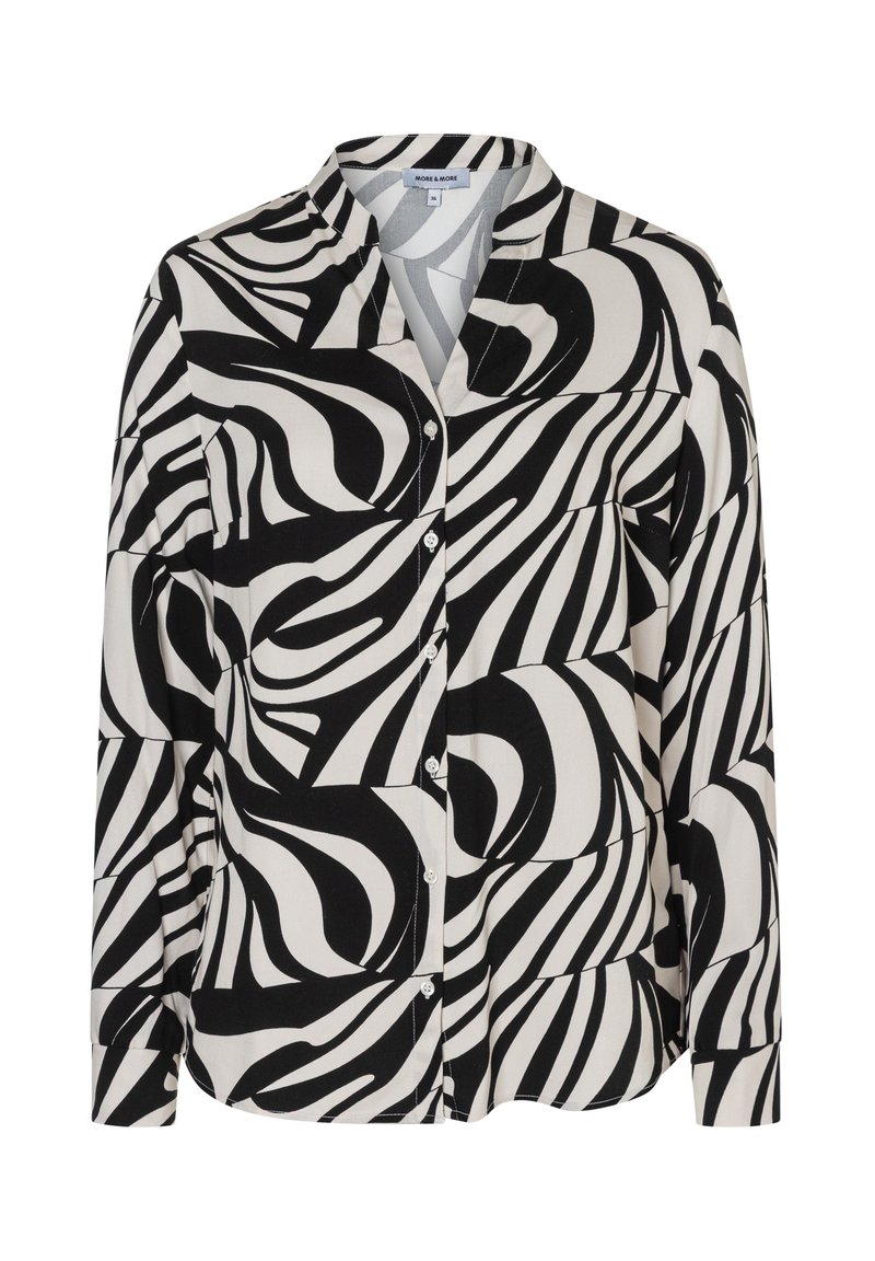 Schwarz-weißes Langarmshirt mit wirbelndem abstraktem Muster. Hergestellt aus glattem Stoff mit durchgehender Knopfleiste und Kragen.