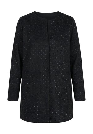 Musta pitkähiha jacketti, jossa on pieniä valkoisia pilkkuja, pyöreä pääntie, nepparikiinnitys ja kaksi etutaskua.
