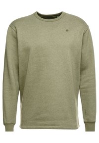 Sudadera verde de mezcla de algodón suave, con mangas largas, cuello redondo y un pequeño detalle de logotipo en la parte frontal.