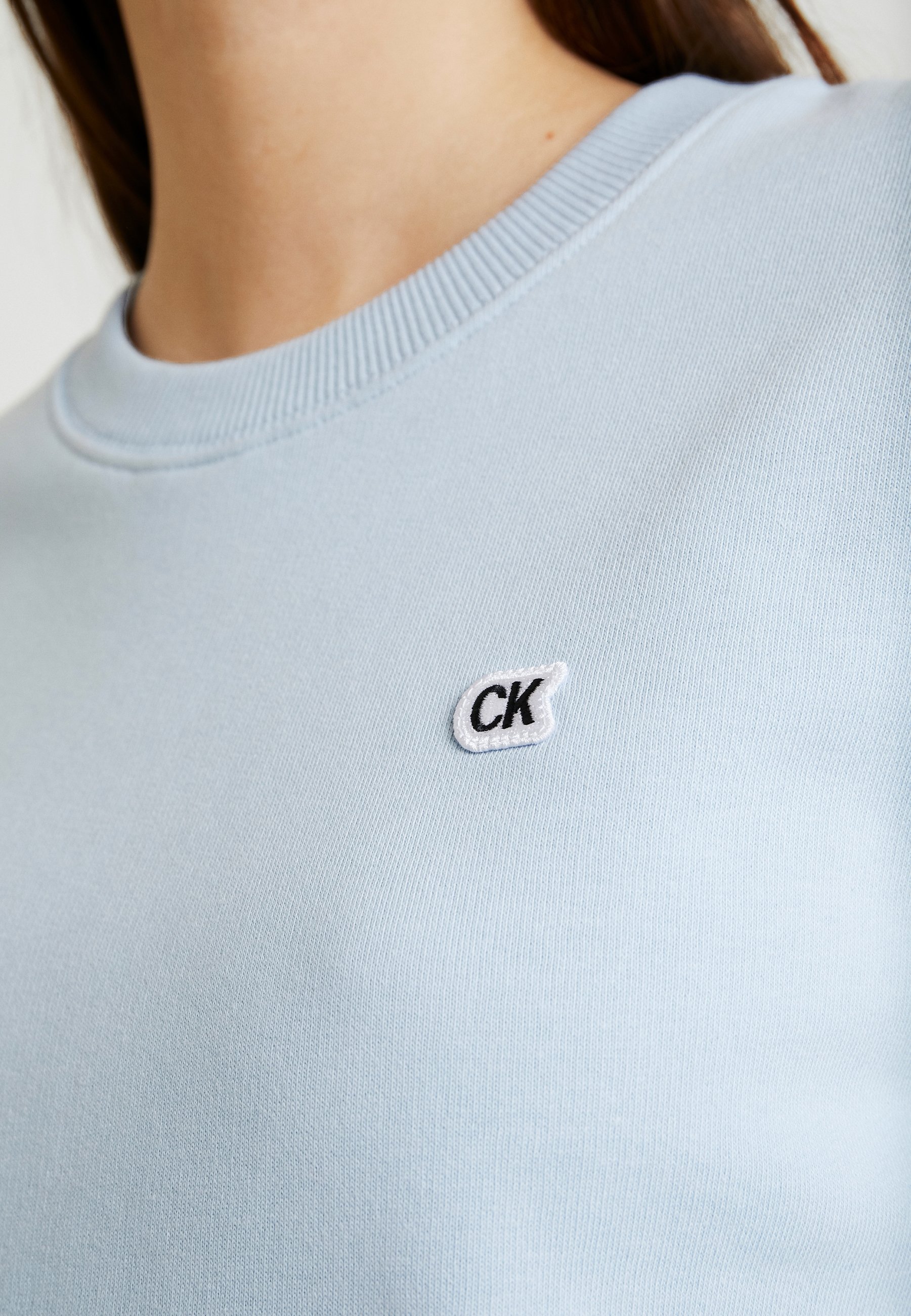 light blue calvin klein sweatshirt