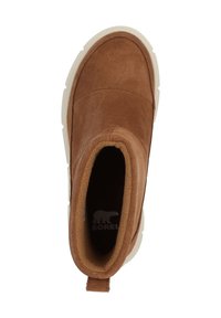 Braune Wildleder-Ankle-Boots mit runder Zehenpartie und weicher Innenauskleidung. Weiße Gummisohle. Verfügt über eine hintere Lasche zum einfachen Anziehen.