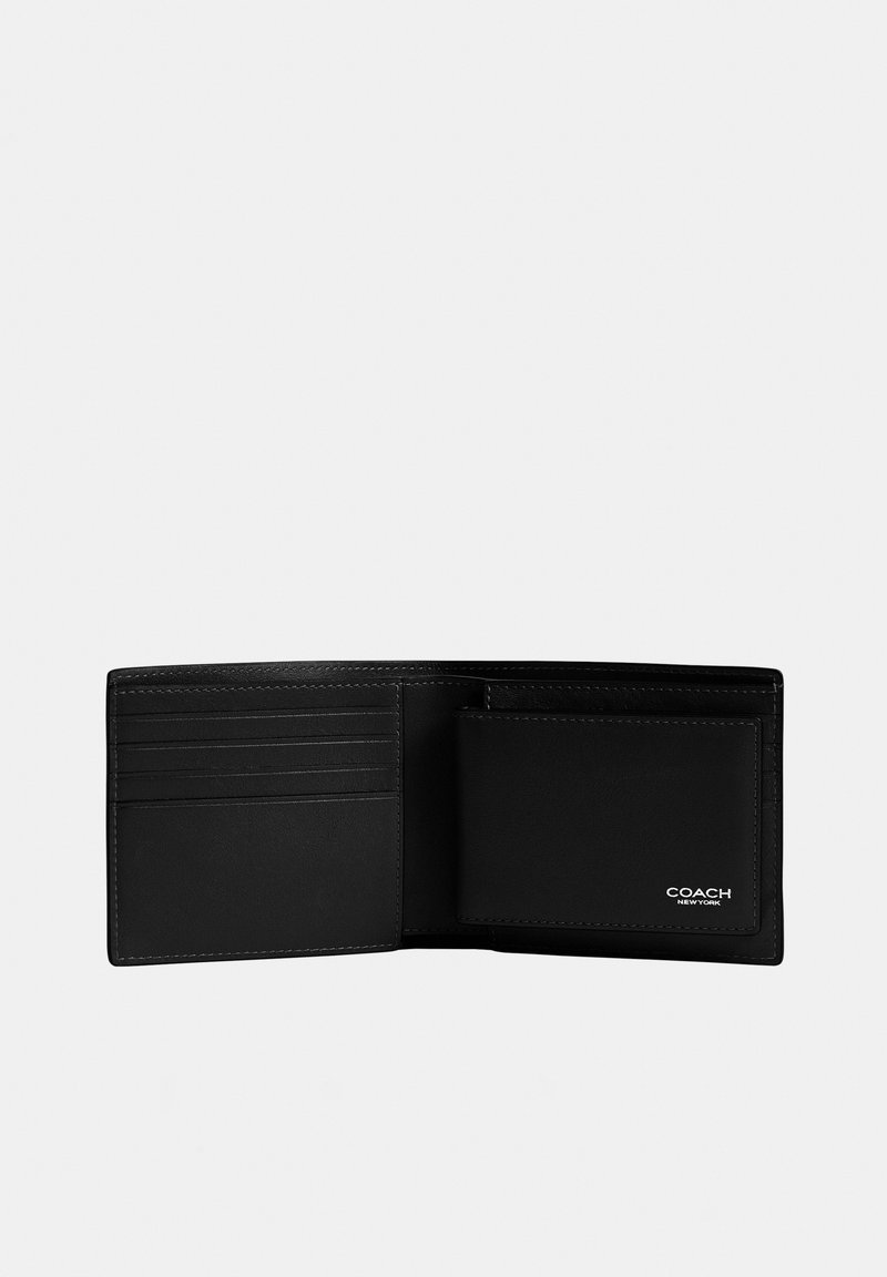 Black leather bifold wallet with multiple card slots and a coin pocket stamped with "Coach New York" logo.