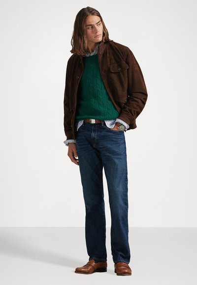 Brown suede jacket, green cable-knit sweater, light blue shirt, dark jeans, brown leather shoes, silver watch. Simple and layered outfit.