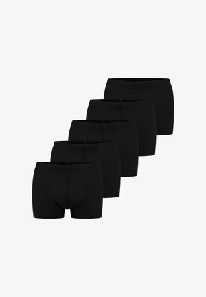 Cinque boxer neri da uomo disposti in fila sfalsata, con cinturini elastici frontali e cuciture sagomate.
