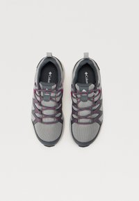 Gray hiking shoes with pink accents, featuring a mesh upper, padded collar, and rubber outsole. Laces are threaded through eyelets.