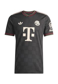Black soccer jersey with subtle checkered pattern, red check detail on collar and sleeves, white logos including Adidas, Telekom, and Allianz.