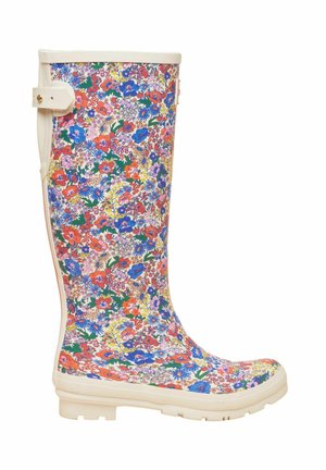 Hoher Gummiregenstiefel mit mehrfarbigem Blumenmuster sowie beigem Besatz und Sohle, seitlich betrachtet.