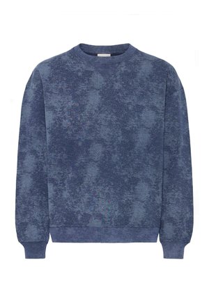 Sinine ümara kaelusega pusa, millel on täpiline, tekstuuriga kangamuster ning soonilised varrukaotsad ja vöökoht.