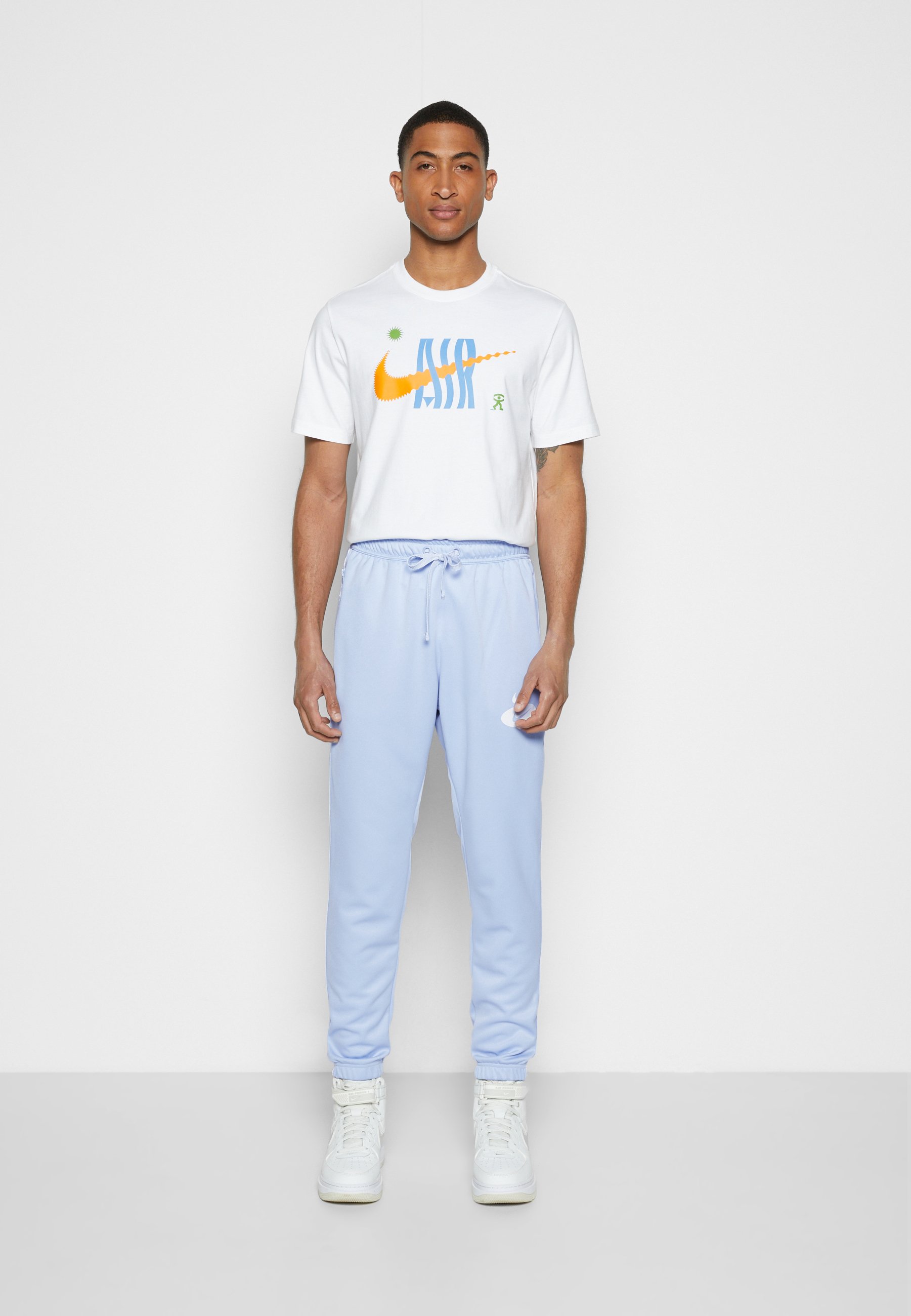 Nike Sportswear PANT - Pantalones deportivos - light marine/azul claro -  Zalando.es