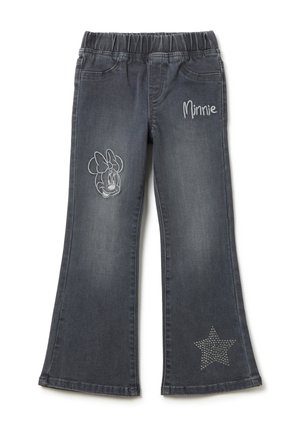 Jean flare en denim gris foncé avec une taille élastique, mettant en vedette une broderie de Minnie Mouse sur une jambe et un accent d'étoile cloutée sur l'autre.