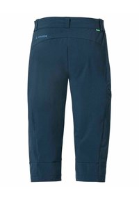 Hüftlange, marineblaue Caprihosen mit glatter Textur, elastischem Bund und seitlichen Taschen. Mit einem dezenten Logo in der Nähe der Taille.