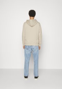 Calvin Klein Jeans SEASONAL MONOLOGO REGULAR HOODIE - Sudadera - plaza taupe/acid light
