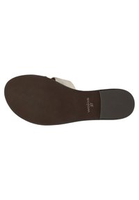 Soletta di sandalo con una base in gomma marrone scuro e finitura texturizzata, e cinture in tessuto chiaro che si incrociano sopra il plantare.