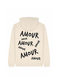 Felpa con cappuccio beige caratterizzata da grande scritta nera "AMOUR" in diverse orientamenti sul retro. Tessuto morbido, vestibilità regolare, polsini a coste.