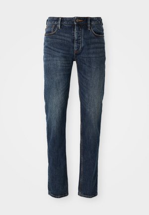 Dunkelblaue Denim-Jeans mit geradem Schnitt, fünf Taschen, Reißverschluss und Knopfverschluss sowie kontrastierenden Nähten entlang der Nähte.
