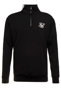 Black zip-up sweatshirt with high collar, featuring a front zipper and white logo on the chest. Smooth fabric and long sleeves.