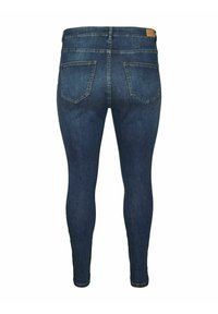 Dark blue denim skinny jeans with a high waistband, featuring two back pockets and a smooth texture.