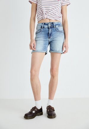 Light blue denim shorts with rolled cuffs, featuring front and back pockets. Paired with a pink and white striped tied-top and dark brown shoes.