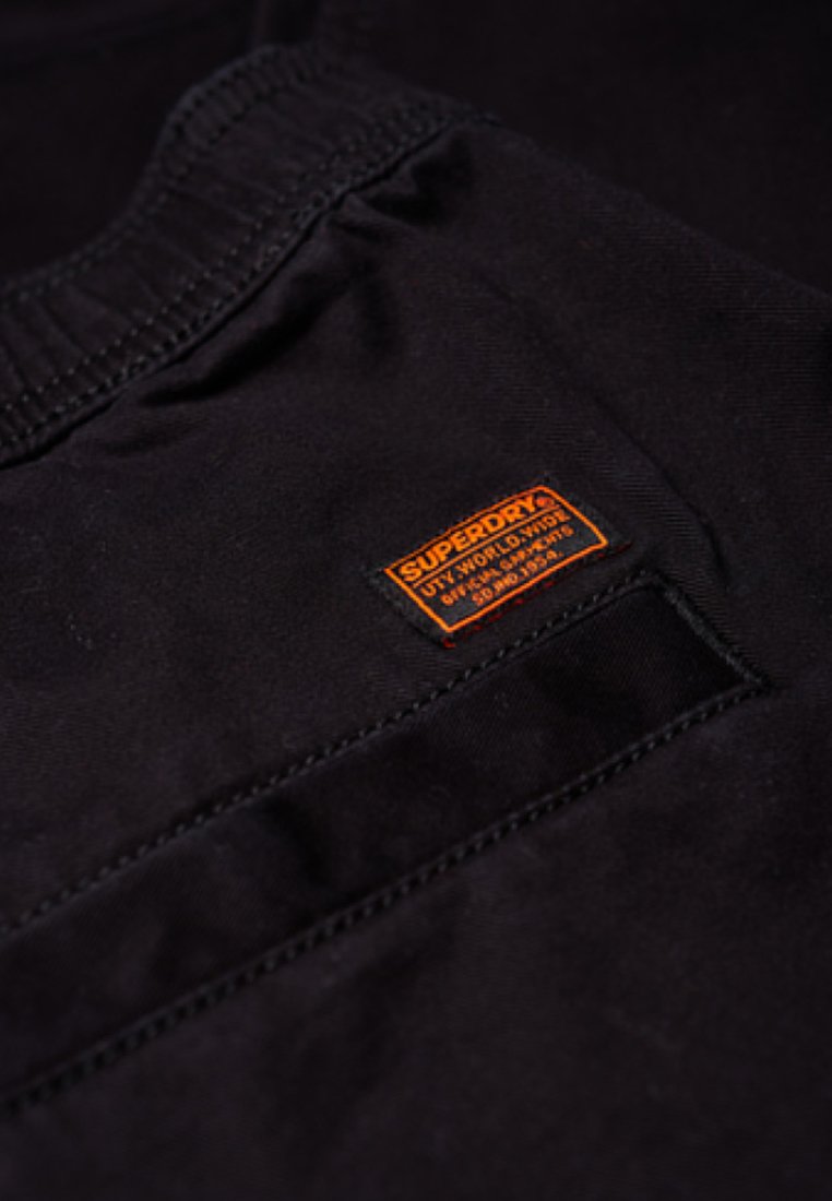 Superdry Trousers - black - Zalando.co.uk