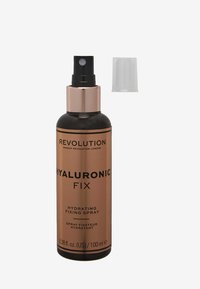 Zwarte cilindervormige fles met een gouden en zwarte dop; heeft een label "Hyaluronic Fix" in vetgedrukte tekst; 100 ml hydraterende fixing spray.