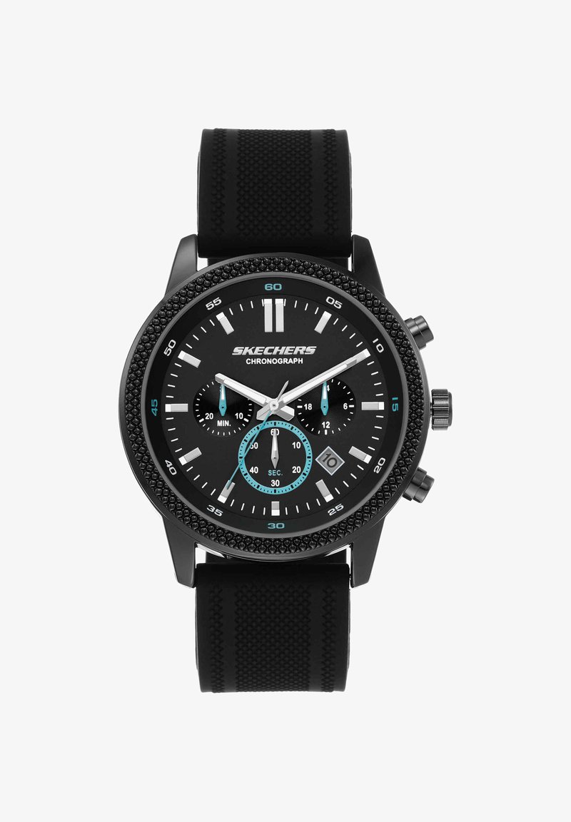 Black Skechers chronograph watch with textured bezel, black silicone strap, three subdials, white and blue details, and date window at 4 o'clock.