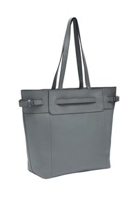 Szara skórzana torba na ramię o wyraźnej formie, z dwoma długimi uchwytami i przednią kieszenią. Posiada gładką fakturę i minimalną ilość elementów metalowych.