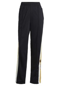 Svarta träningsbyxor med elastisk midja, vita och gyllene vertikala ränder på sidorna och Adidas-logotyp på höger ben.