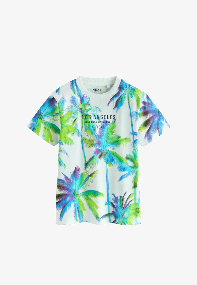 T-shirt en coton blanc avec un imprimé tropical vibrant de palmiers en vert et bleu, accompagné du texte "LOS ANGELES CALIFORNIA SINCE 1982".