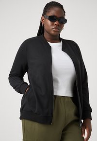 ONLY Carmakoma CARJOYCE - Bomber Jacket - black
