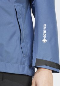 adidas Terrex XPR GORE PAC JJACKET - Giacca hard shell - blue