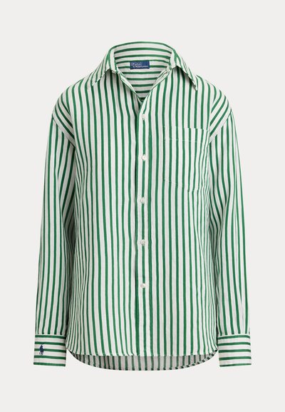 Zeleno-bielá vertikálne pruhovaná košeľa s dlhým rukávom, zapínaním na gombíky, golierom, náprsným vreckom a vyšívaným logom na ľavom manžete.