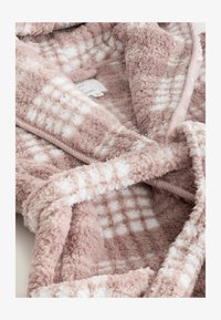 Sélectionné, pink check