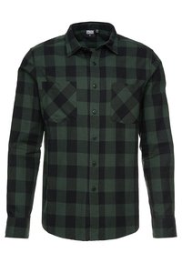 Camicia di flanella a quadri verdi e neri con maniche lunghe, chiusura frontale con bottoni e due tasche sul petto. Tessuto morbido, design casual.