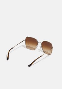 COACH Päikeseprillid - shiny light gold-coloured