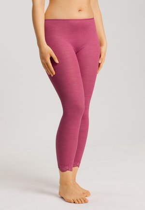 Pink ribbed leggings featuring a fitted design and lace trim at the cuffs. Made from a soft, stretchy material for comfort.
