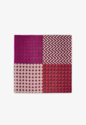 Rectangular fabric with four color-blocked sections featuring pink and red geometric patterns: triangles, zigzags, and circles.
