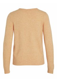 Pull en maille beige à manches longues avec encolure ronde et poignets et ourlet côtelés, vu de dos.